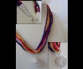 Colored ribbon necklace with silver ball