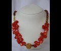 Orange corals and brown pearls