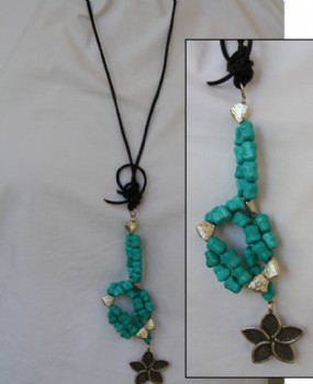 Turquoise and silver in leather necklace