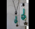 Turquoise and silver in leather necklace