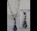 Large metallic silver chain with blue teardrop murano